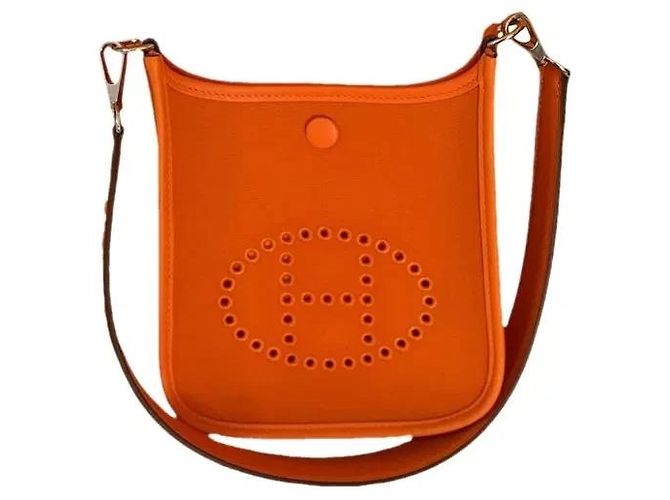 Saco de ombro Hermès Evelyne em couro laranja