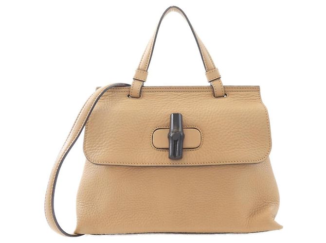Bolsa de mão Gucci em couro bege