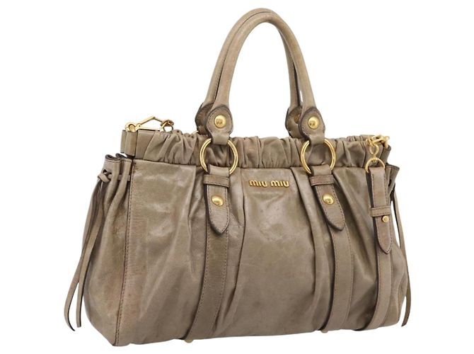 Bolsa Miu Miu Vitellolux em couro 2way Bege Tom Dourado Auth 202112A