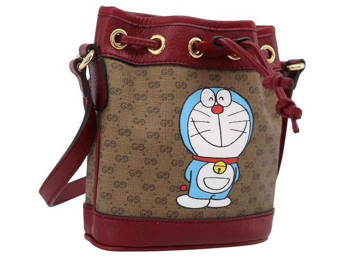GUCCI Doraemon Micro GG Supreme Bag PVC Beige Gold 647801 Auth 201921SAM D'oro