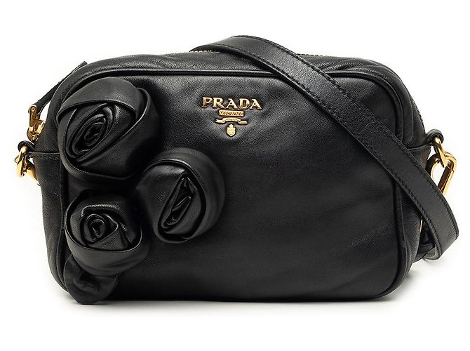 Borsa a tracolla Prada in Nappa nera con rosetta Nero