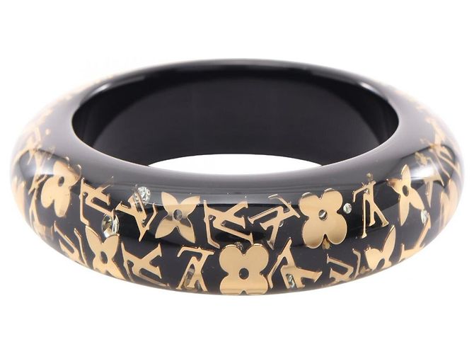 Bangles Louis Vuitton in resina nera e oro Nero D'oro