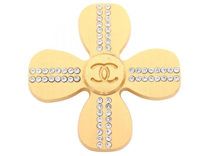Spilla Chanel Coco Mark placcata oro D'oro