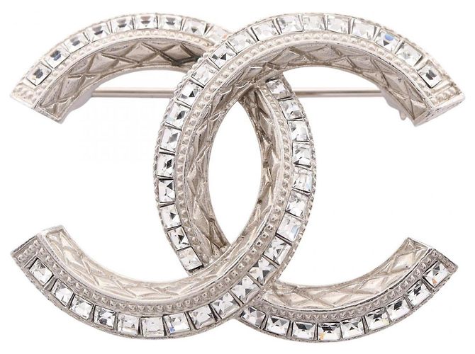 Broche Chanel Coco Mark Plata