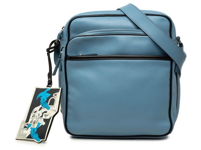 Borsa a tracolla Prada con placca logo triangolare Blu chiaro