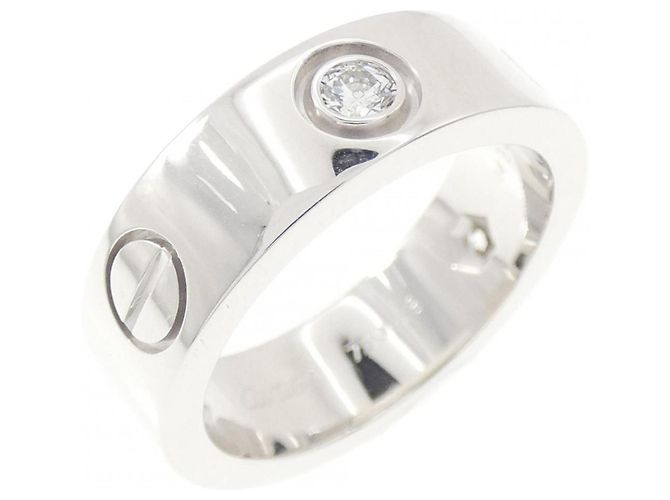 Cartier Love Ring mit halbem Diamant