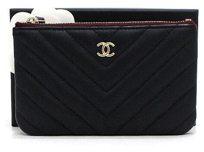 Chanel Mini Pochette Caviar Chevron Noir