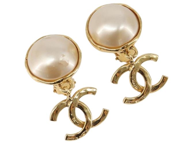 Orecchini CHANEL metallo Gold Tone CC Auth 201011