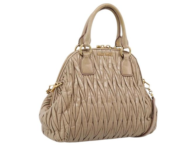 Bolsa de Mão Miu Miu Matelassé em Couro 2way Bege Tom Dourado Auth 200801V