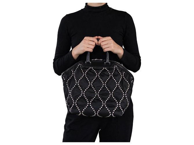 Alexander McQueen Lederhandtasche gesteppt mit Nieten - Schwarz