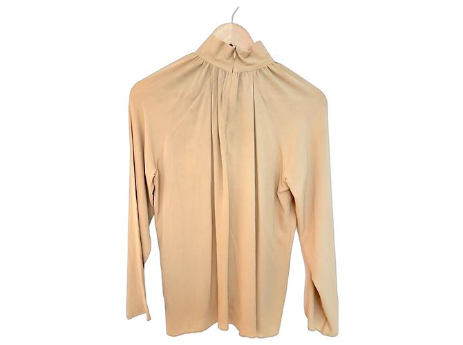 The Row Blusa de seda cuello alto Beige