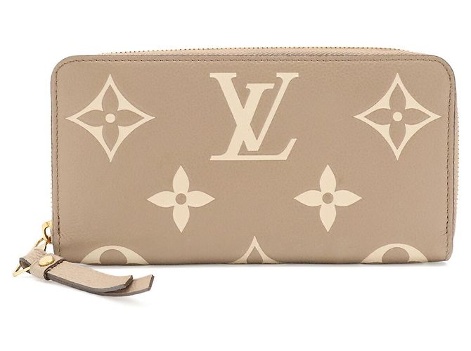 Cartera Zippy Monogram Empreinte Louis Vuitton Gris Crudo