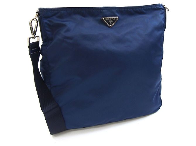 Bolsa Messenger Prada em nylon e couro azul marinho