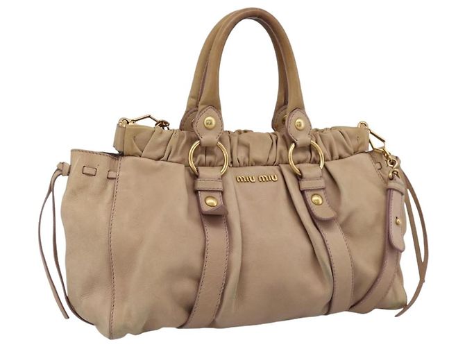 Bolsa de mão Miu Miu em couro 2way Bege tom dourado Auth 199333A