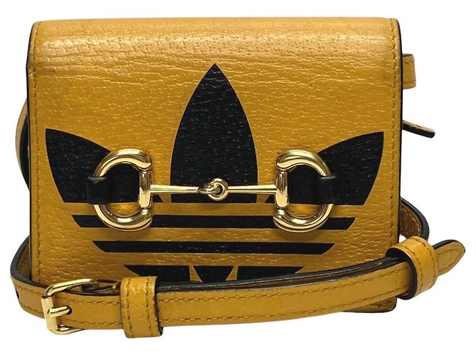 Cartera bi-fold Gucci Horsebit de cuero amarillo