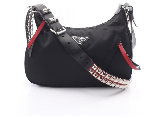 Borsa a tracolla Prada NEW VELA borchiata Nero Rosso