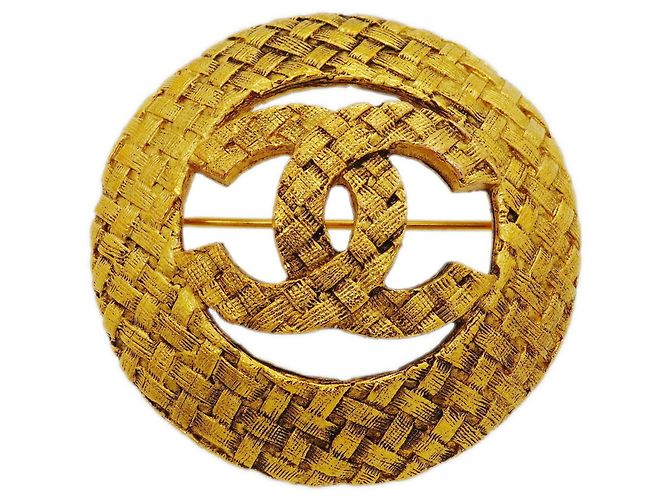 Spilla Chanel placcata oro D'oro