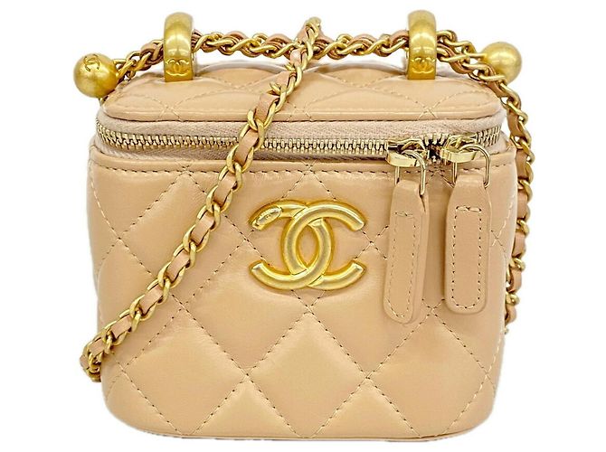 Bolsa Vanity com corrente Chanel Matelassé Bege