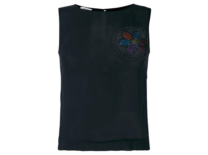 Top Moschino de seda negro con aplique bordado