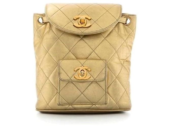 Chanel Mochila anos 90 Dourado