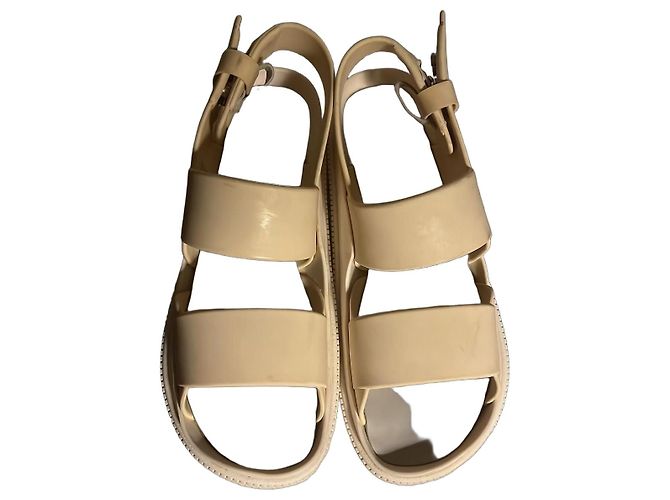 Givenchy Sandalias Planas de Plástico Beige