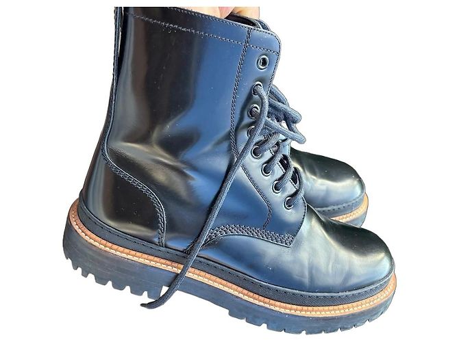 Black leather boots by Burberry