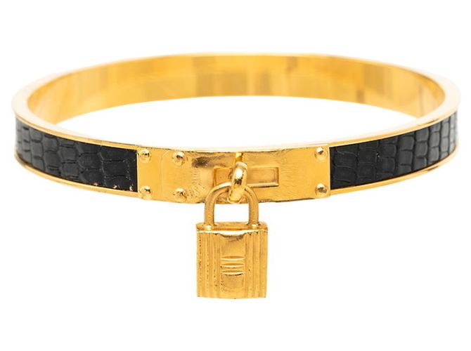 Pulseira Hermès Kelly em couro preto e dourado