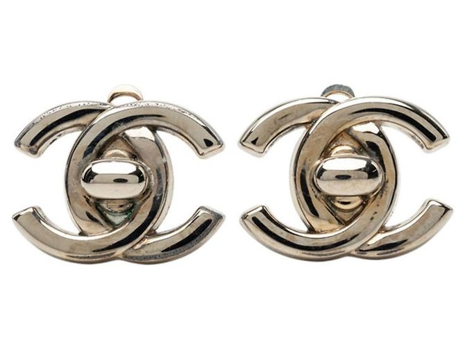 Orecchini a clip vintage Chanel Coco Mark Argento