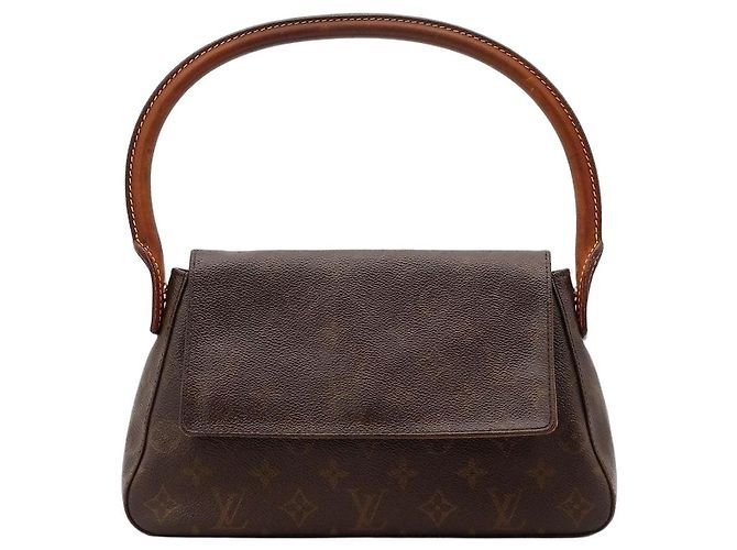 Bolsa Pochette Accessoires em canvas Monogram Louis Vuitton Marrom Monograma