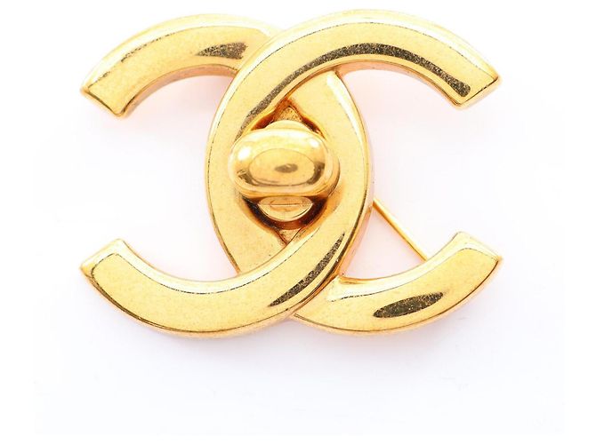 Spilla Chanel Coco Mark placcata oro D'oro