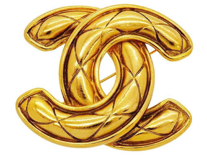 Spilla Chanel Matelassé dorata D'oro