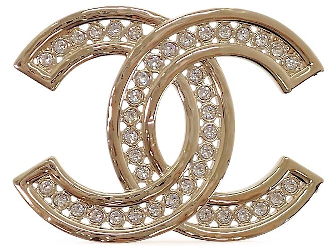 Broche Chanel CC banhada a ouro com strass Dourado