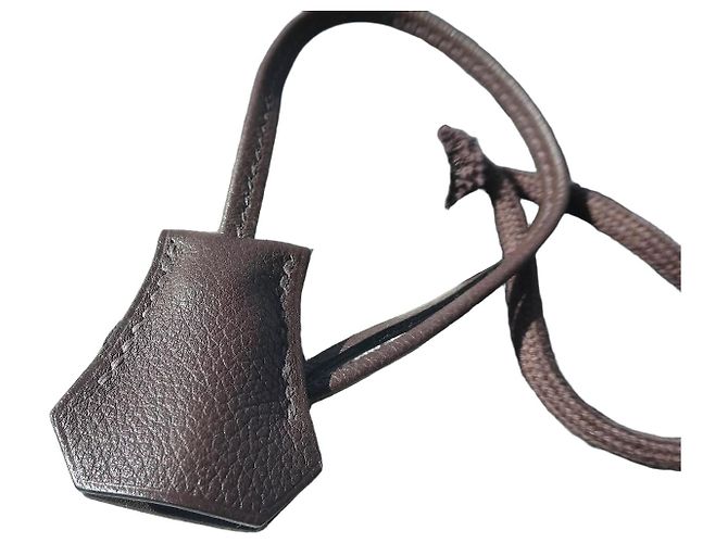 Hermès Clochette e Tracella in Pelle Marrone