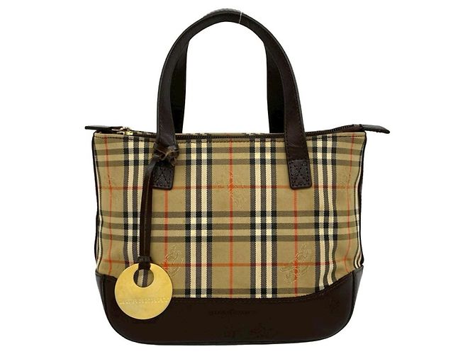 Bolsa Burberry Nova Check em lona e couro Marrom Bege