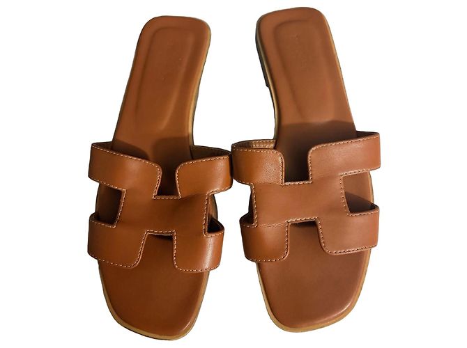 Hermès Oran Leder-Sandalen Braun