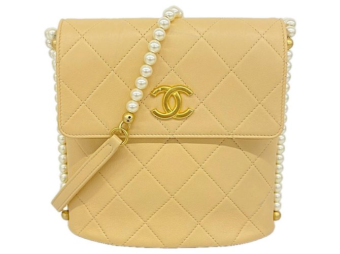 Timeless Bolsa de Ombro Chanel Matelassé em pele de cordeiro Bege