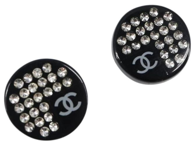 Orecchini CHANEL in plastica Nero CC Auth 200741V