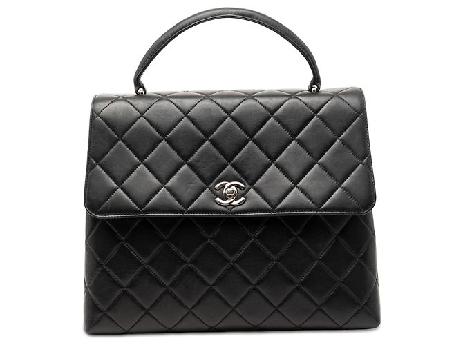 Bolsa Chanel Kelly Top Handle em pele de cordeiro acolchoada preta Preto