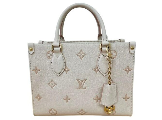 Louis Vuitton Monogram Empreinte OnTheGo PM Tote Bag Pink
