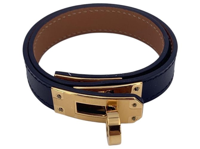 Hermès Pulseira Kelly Double Tour em couro preto e hardware dourado Hermes
