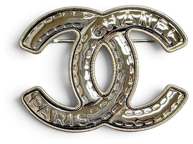 Spilla Chanel Coco Mark Logo Stitch Argento D'oro
