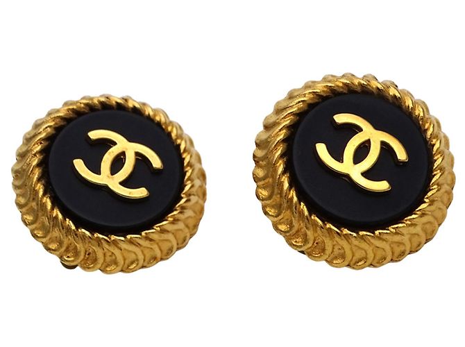Orecchini Chanel in metallo nero e oro D'oro