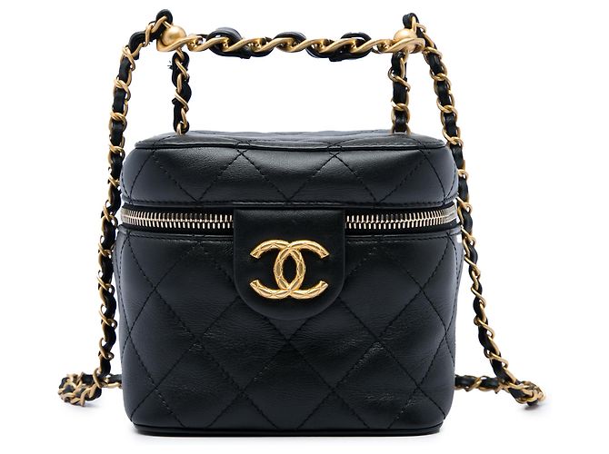 Chanel Pequena Vanity Case em pele de vitelo acolchoada preta com corrente e barra Preto