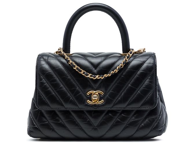 Bolsa Chanel Mini Chevron Coco Top Handle em couro de bezerro envelhecido preto