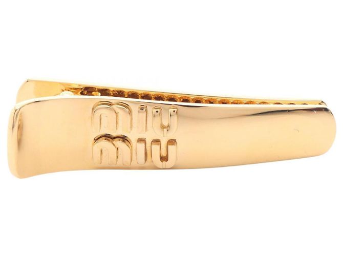 Fermi capelli Miu Miu placcati in oro D'oro