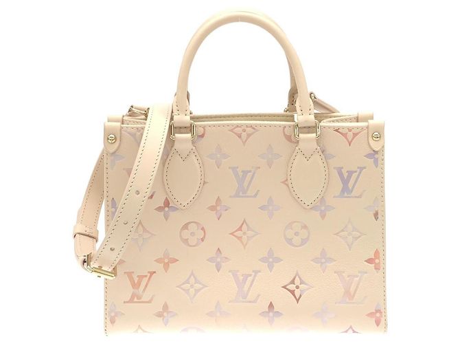 Bolsa Louis Vuitton Monogram Empreinte OnTheGo PM Bege