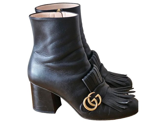Botines Gucci GG Marmont de piel negra con flecos Negro