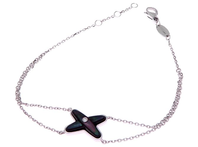 Pulsera Chaumet de oro blanco de 18K con dijes