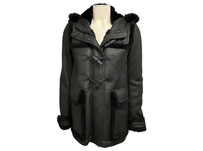 Giacca in pelle Burberry Brit nera foderata in shearling con cappuccio bordato di pelliccia Nero