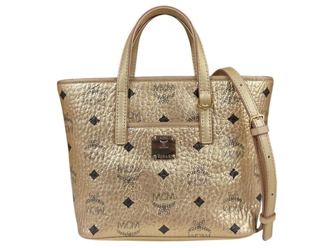 Bolsa de Ombro MCM em Couro Dourado